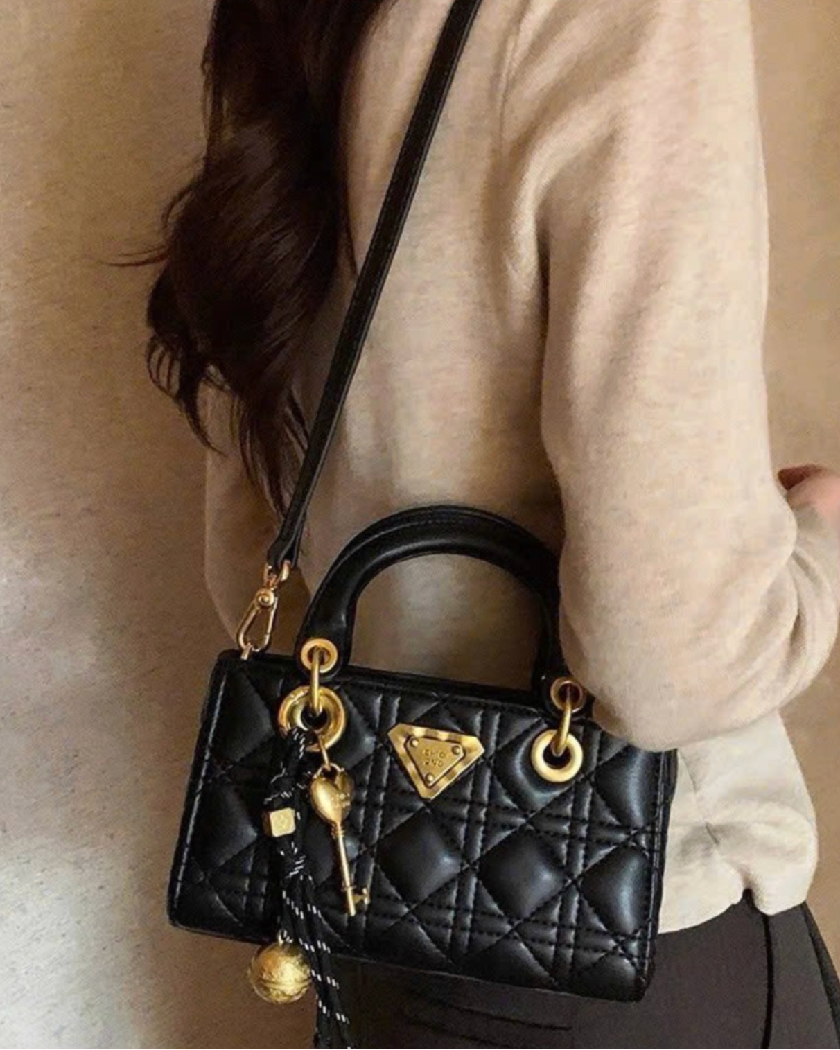 The Signature Lock Handbag