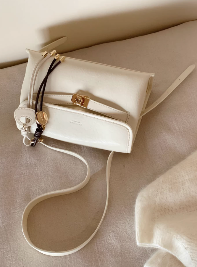The Serene Crescent Flap Bag